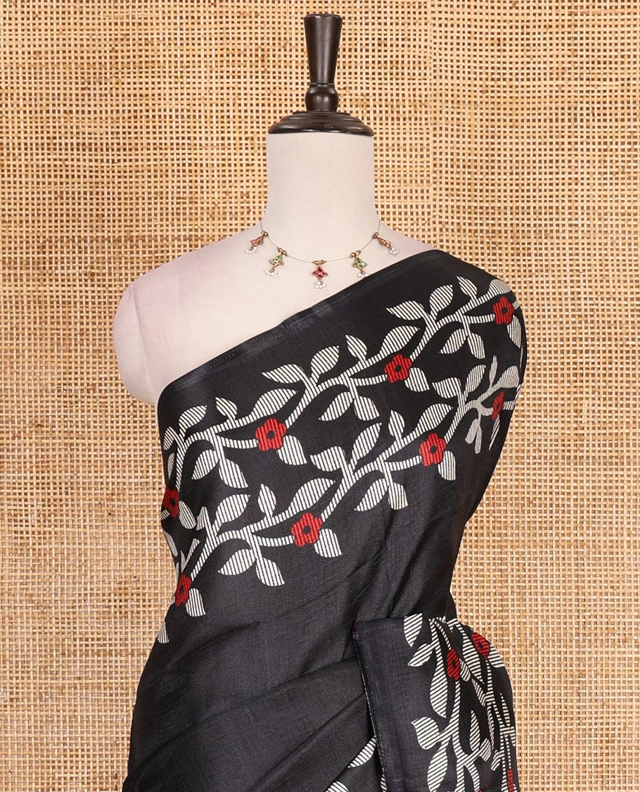 Black plain khadi cotton saree, floral creeper printed border, and pallu with small buttas printed blouse