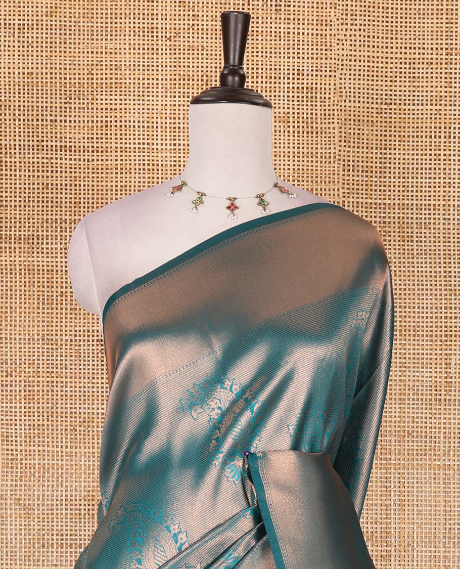 Rama green paisley zari jacquard Kanchi tissue saree, zari border, pallu steeped with paisleys, and jacquard matching blouse