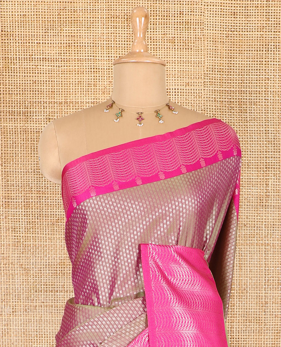 Sage green small zari buttas woven elite soft silk saree, contrast zari woven scallop satin border, jaal pallu, and a contrast chakram zari motifs blouse