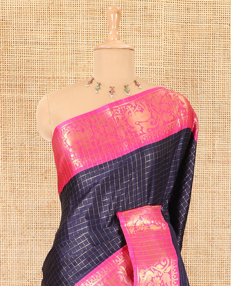 Navy blue golden zari checked semi-taffeta saree, contrast zari border of deer and peacock motifs, striped pallu, and a contrast zari design blouse