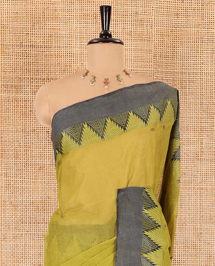 Green thread buttas Bengal cotton saree, contrast temple border, and pallu of buttas and stripes