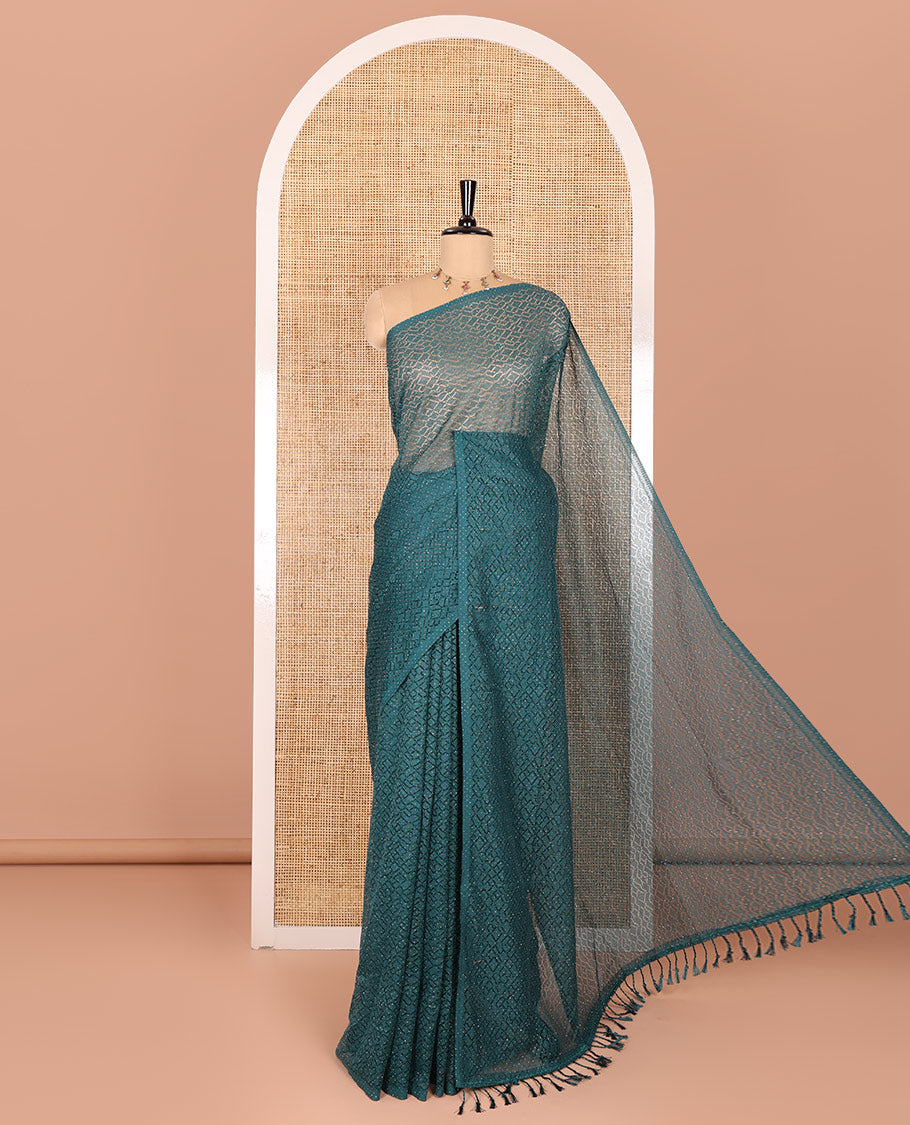 Borderless violet sparkling glitter russel net saree with self-pallu, and a contrast floral printed and zig-zag patterned blouse