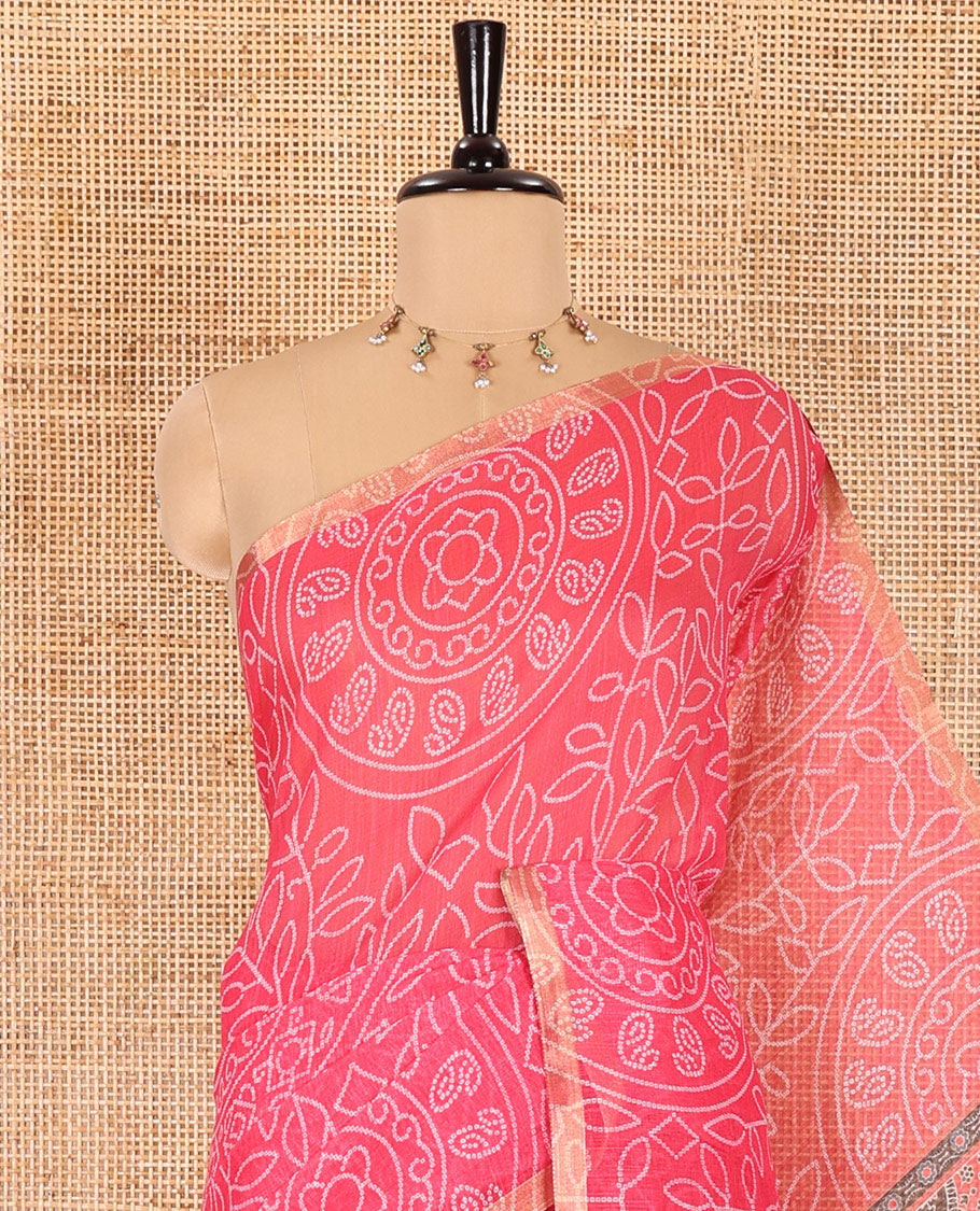 Pink bandhani-style floral and chakra printed saree, zari piping border, contrast ajrakh printed pallu, and contrast ajrakh printed blouse