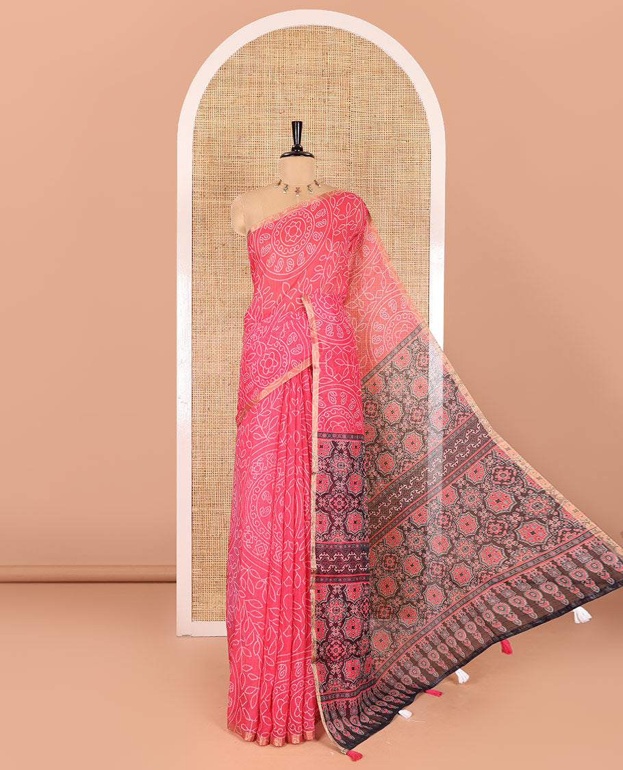 Pink bandhani-style floral and chakra printed saree, zari piping border, contrast ajrakh printed pallu, and contrast ajrakh printed blouse