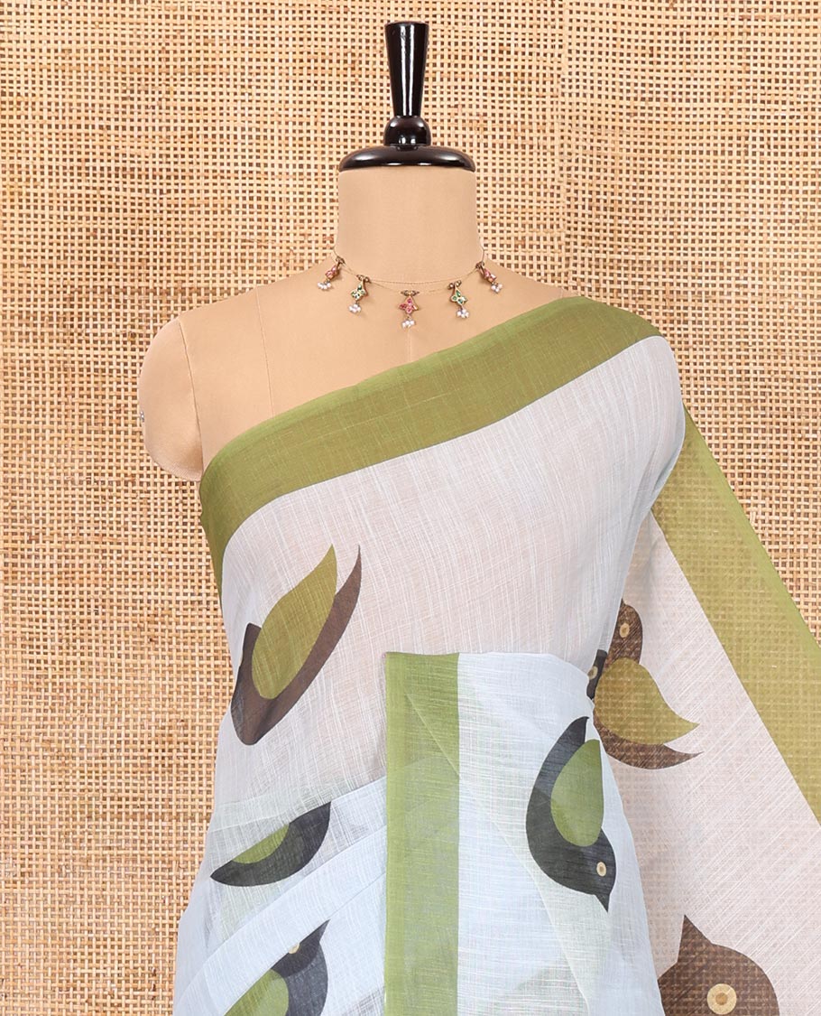 Grey birds motifs linen cotton saree with contrast plain border , birds mofits pallu and leaf printed blouse