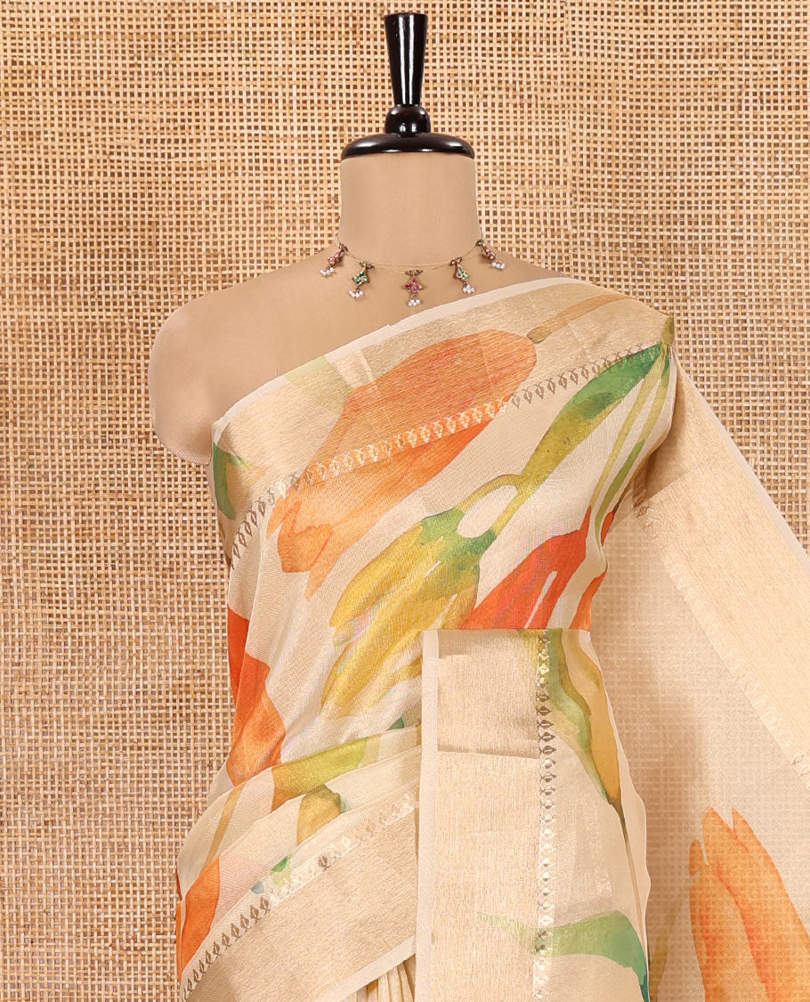 Gold Tissue Saree, Adorned by Tulip-Style Floral Printed All Over Its Body, Gleamed Up with a Zari Printed Border, Pallu with a Realistic Floral Print, and Paired with a Matching Printed Blouse