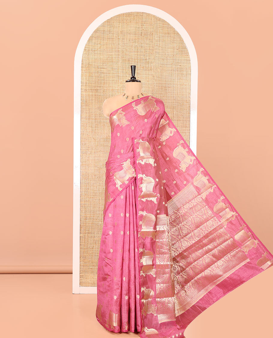 Onion Pink Art Tussar Saree, Embellished with Gold Zari Buttas All Over Its Body, Highlighted by a Zari Border of Pichwai Cow Motifs, Grandly Woven Pallu, and Paired with a Matching Blouse