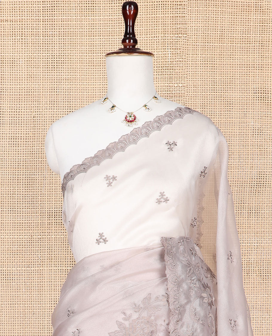 Light brown embroidered tissue organza saree with floral embroidery, scallop border & embroidery pallu along with embroidered blouse