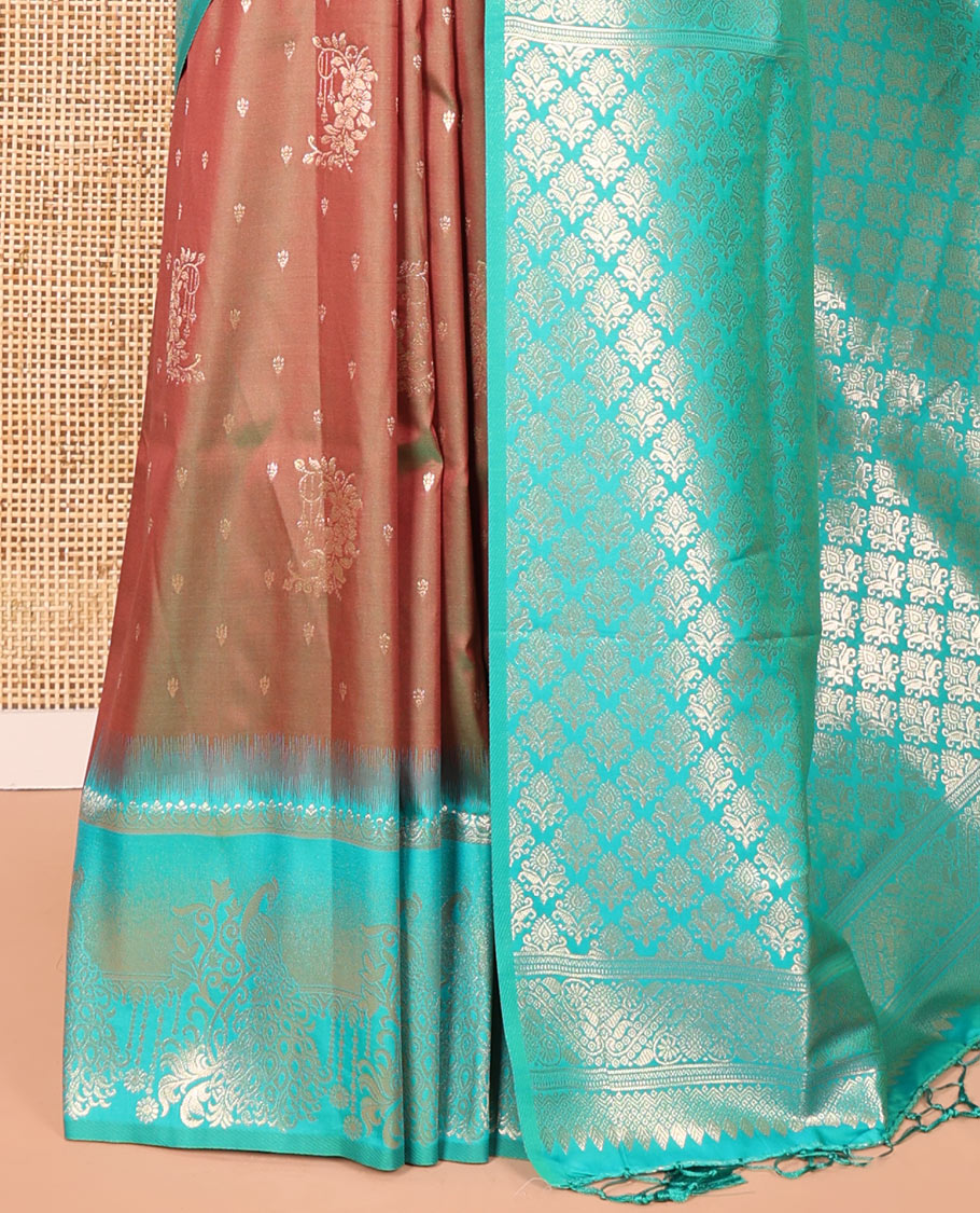 Mehendi Green Elite Soft Silk Saree, Detailed with Zari Buttas on Its Body, Complemented by a Contrast Peacock-Floral Zari Blouse, Intricately Designed Pallu, and Paired with a Contrast Blouse