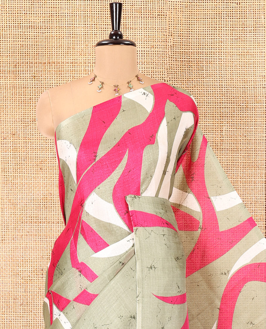 Borderless Apple Green Khadi Cotton Saree, Accentuated with Batik-Style Vines Printed on Its Body, a Subtle Self-Pallu, and Paired with a Matching Blouse