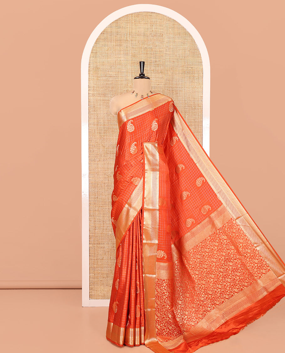 Orange Satin Silk Saree, Enriched with Paisleys and Zari Checked Design on Its Body, Highlighted by Zari Traditional Design Border, Floral Jaal Pallu, and Paired with a Matching Blouse