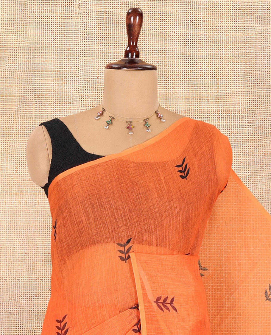 Borderless Orange Linen Cotton Saree, Adorned with Leaf Print, a Contrast Leaf-Printed Pallu, and Contrast Blouse
