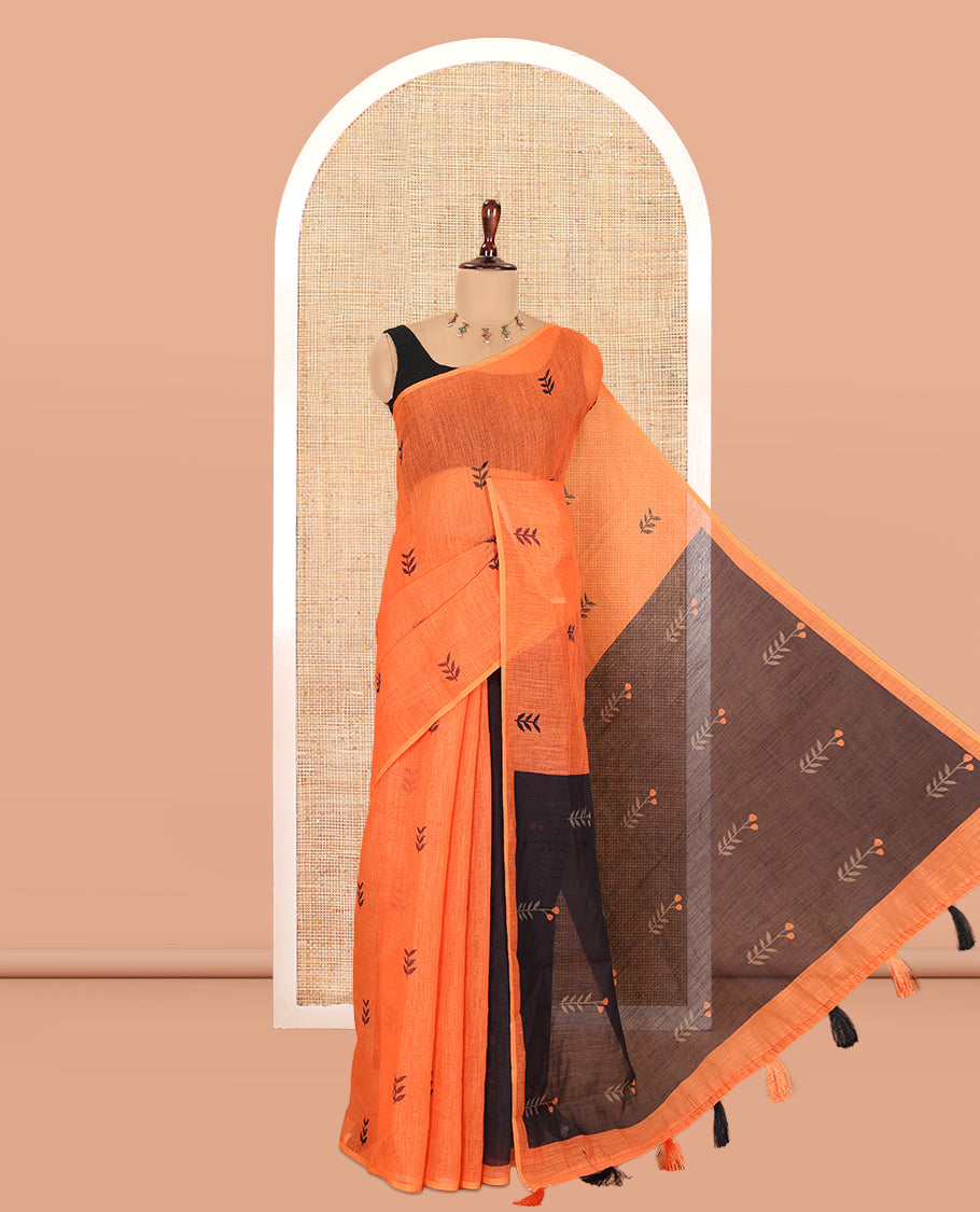 Borderless Orange Linen Cotton Saree, Adorned with Leaf Print, a Contrast Leaf-Printed Pallu, and Contrast Blouse