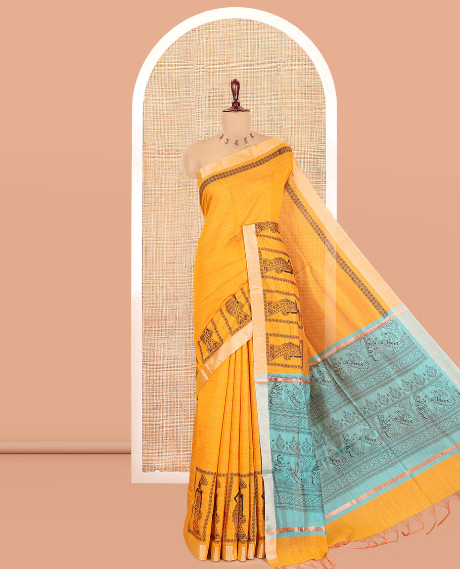 Yellow Semi-Katan Silk Saree, Adorned with Human Figurine, Copper Zari Border, Contrast Warli Pallu, and a Contrast Blouse