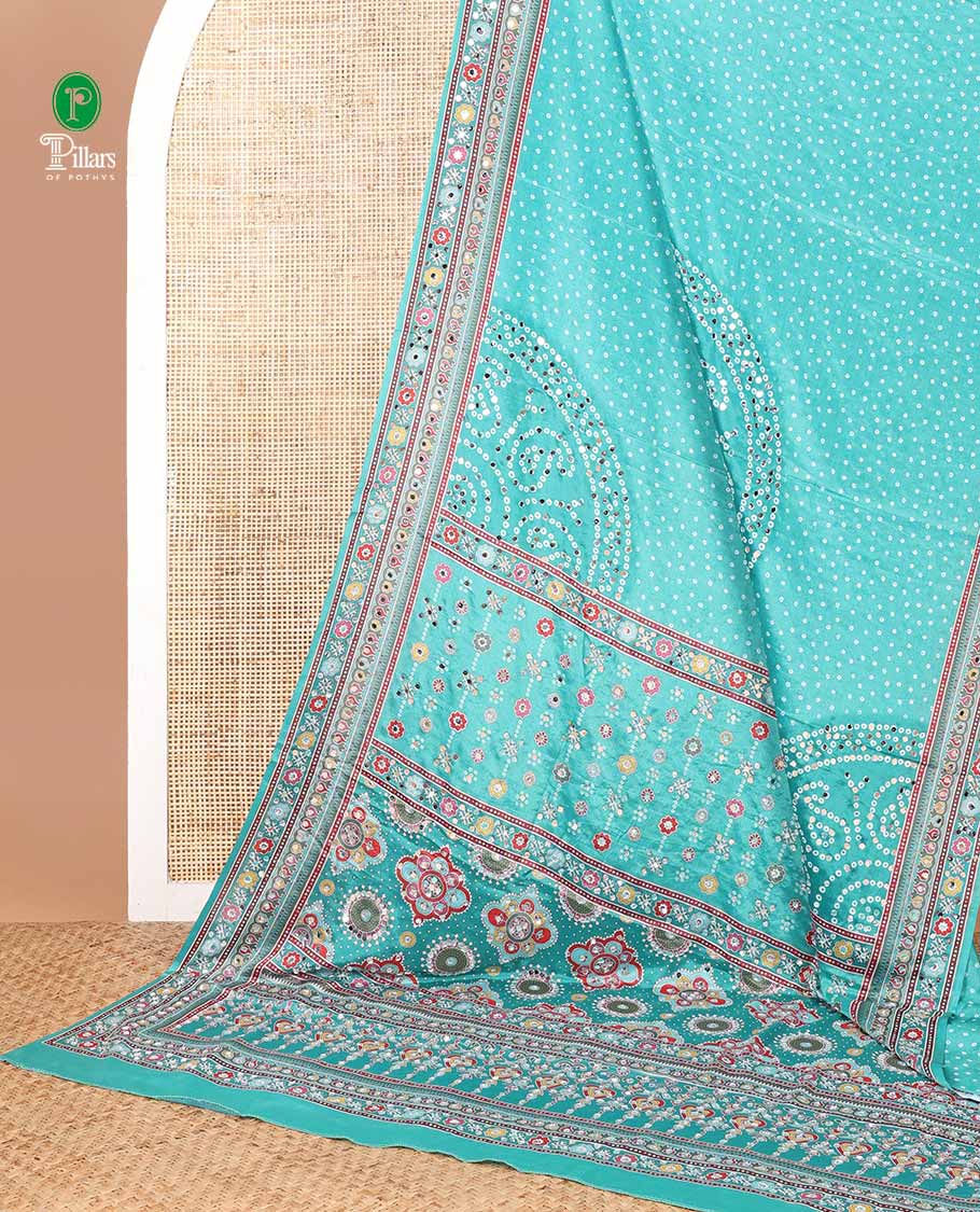 Rama green bandhani printed , mirror work synon silk saree with printed border, mirror work & printed pallu along with bandhani printed blouse