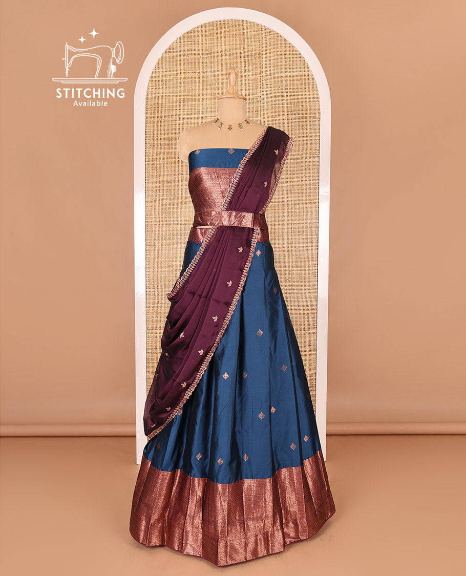 Peacock blue taffeta silk half-saree, zari buttas and contrast traditional zari bordered skirt, a matching taffeta silk blouse, and contrast embroidered satin georgette dhavani