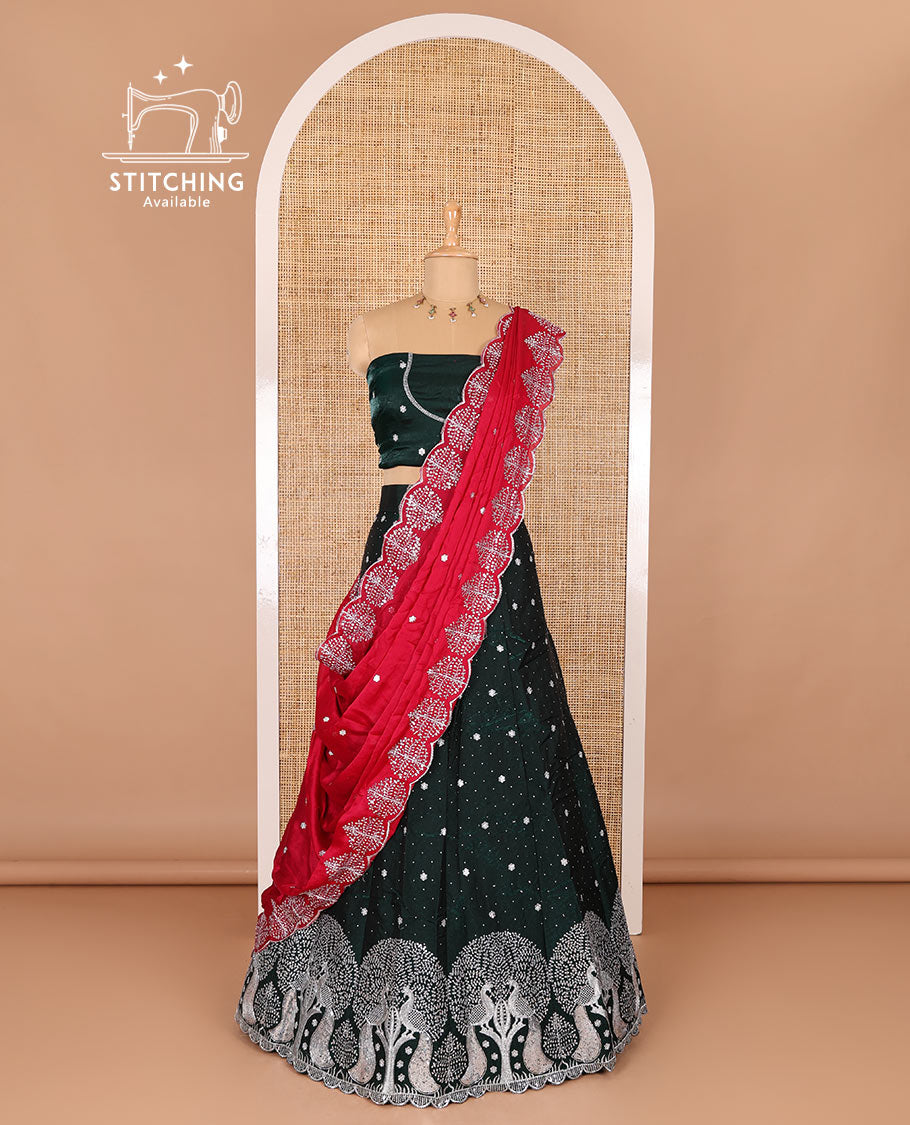 Dark green half-saree, buttas, tree, and peacock motifs embroidered semi-taffeta silk top, matching blouse, and contrast scallop embroidered dhavani