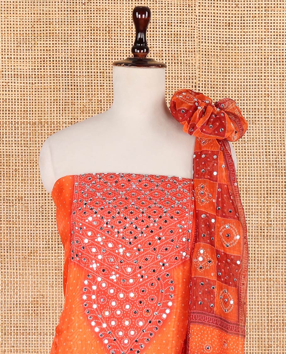 Orange double shaded bhandani print organza chudidhar material top with santoon material pant & bhandani print, mirror work dupatta