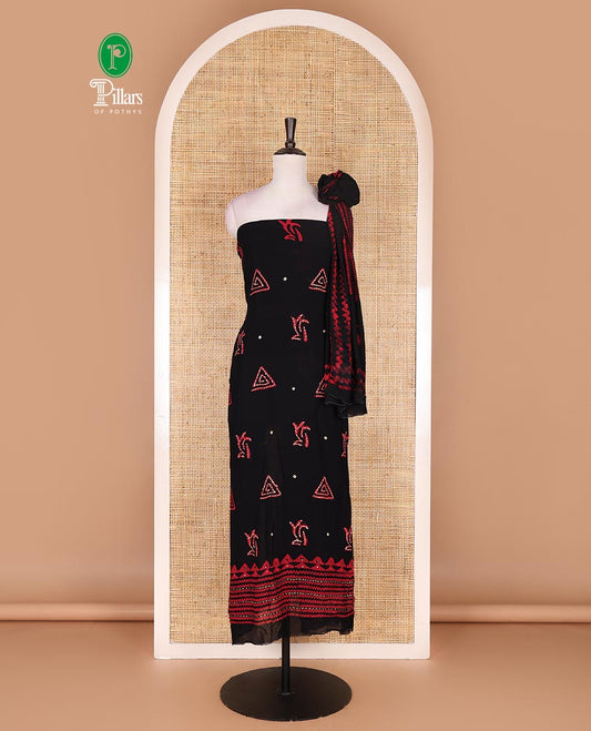 Black and pink material chudidar set, batik print with kantha embroidered top, plain contrast bottom, and batik printed dupatta