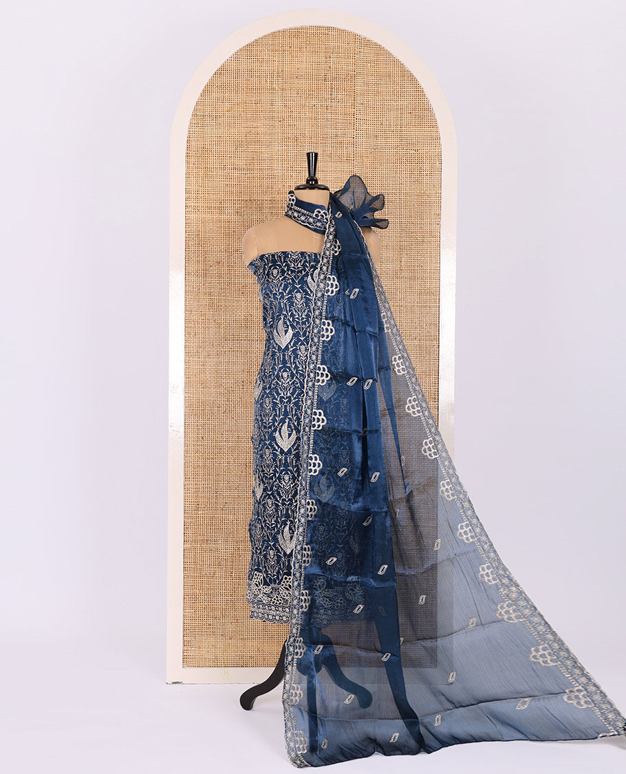Peacock blue material chudidar set, intricate thread embroidered with stone work velvet organza top, a matching santoon bottom, and a embroidered velvet organza dupatta