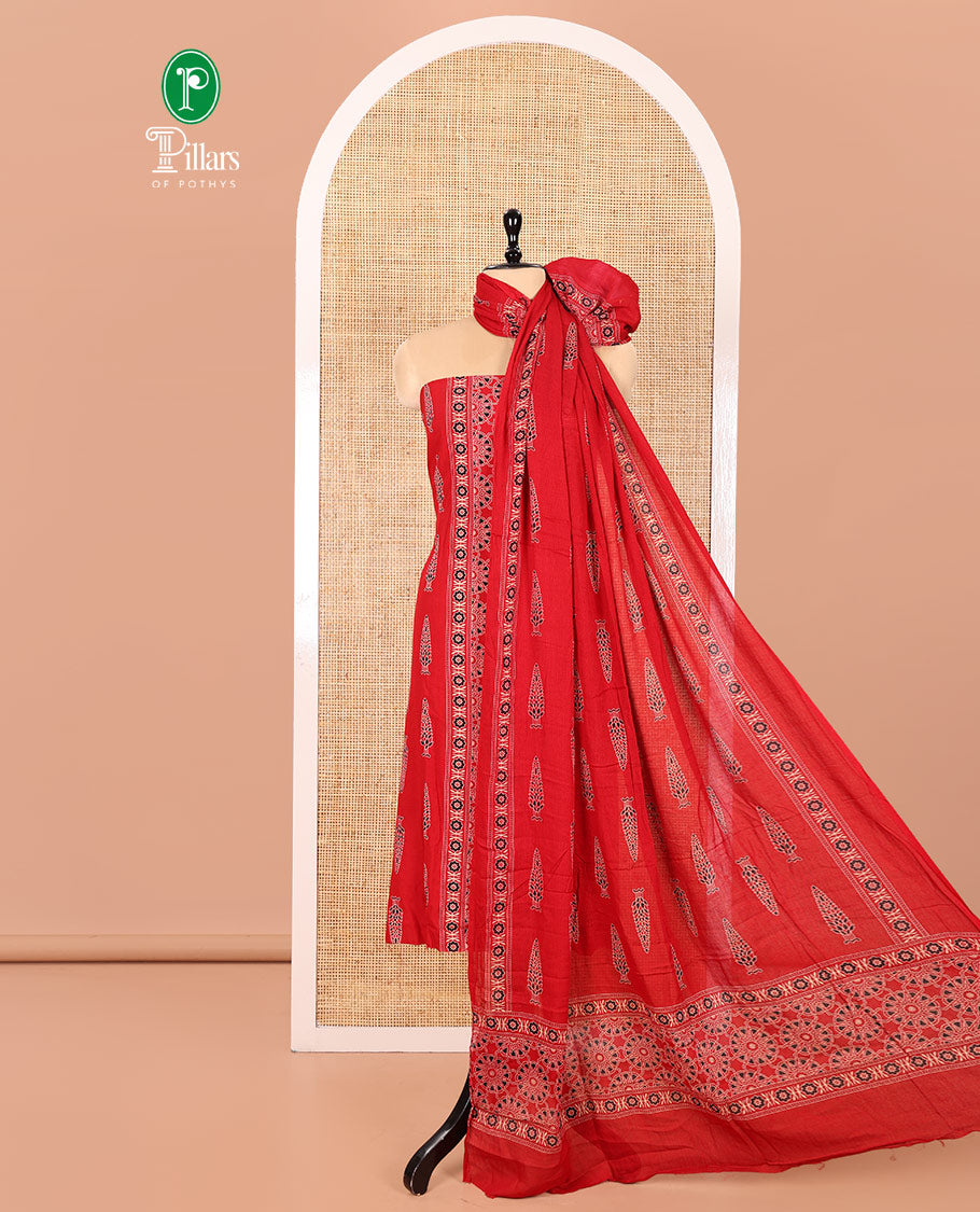 Red Rayon Material Chudidhar Set, Adorned with Ajrakh-Style Floral Printed Top, Elegantly Printed Bottom, and Rayon Dupatta of Ajrakh-Style Floral and Tree Motifs Print