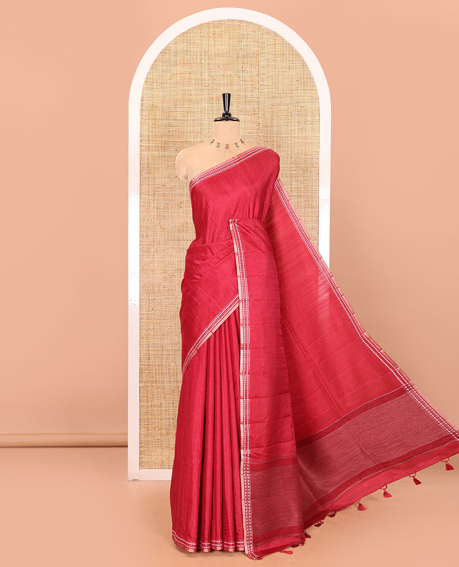 Maroon plain fancy tussar saree, temple motifs woven thread border, striped pallu, and a matching blouse
