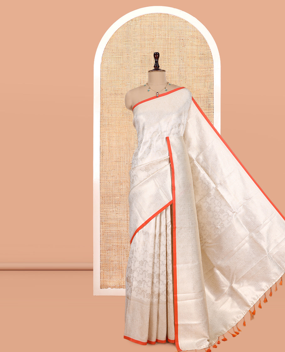 Off-White-Orange Semi-Silk Saree, Adorned with Floral Jacquard Design, a Zari Paisley Border, and a Contrast Blouse