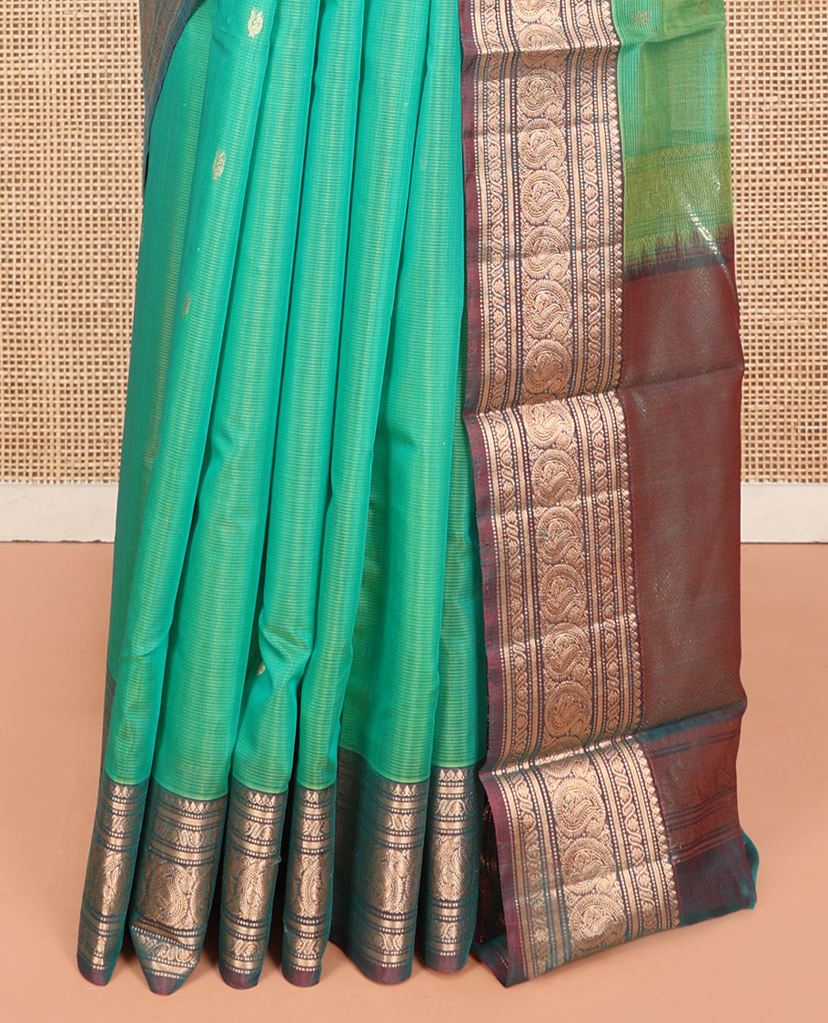 Sea Green Silk Cotton Saree, Elevated with Buttas, Complemented by Contrast Traditional Paisley Zari Design Border, Zari-Decked Pallu, and a Contrast Blouse