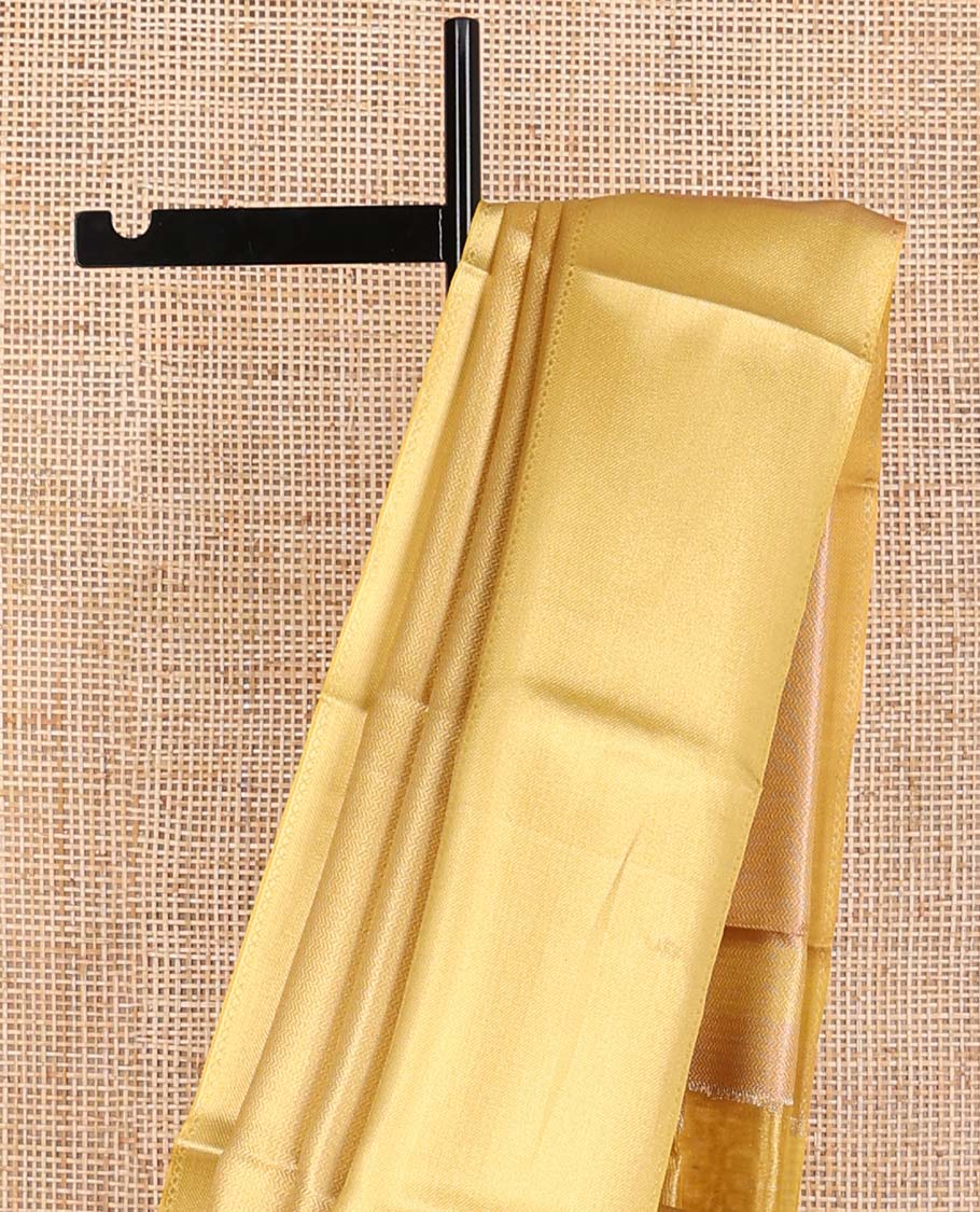 Yellow chevron design tissue saree with contrast striped border & zari design pallu