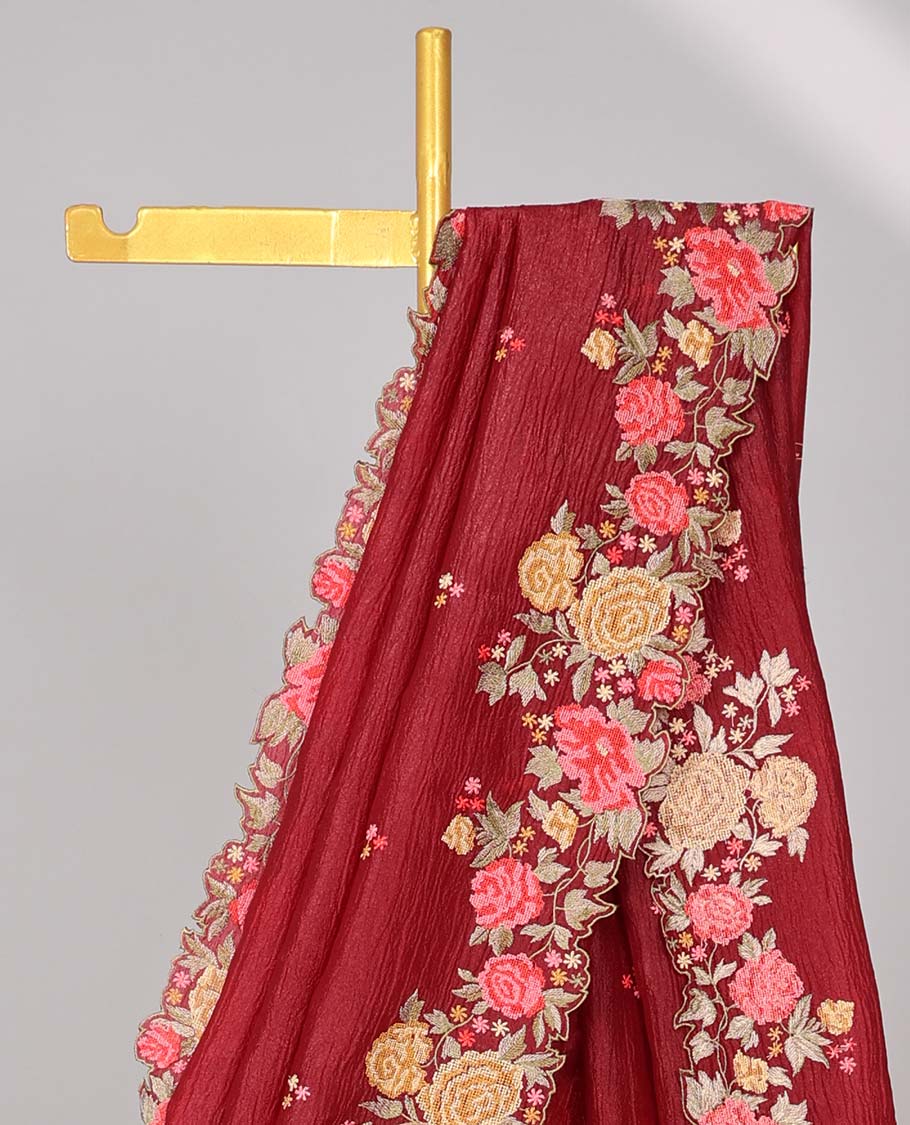 Maroon crushed tissue saree with all over floral motifs & floral scallop border