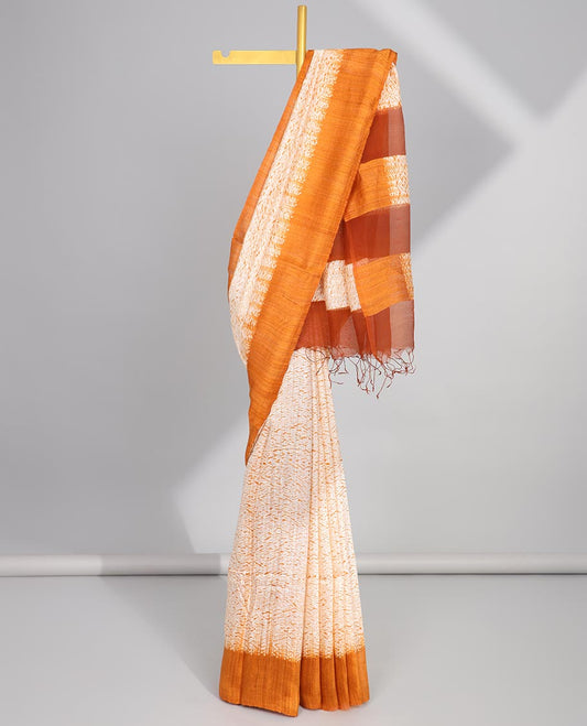 Cream abstract design matka silk saree with contrast plain border & orange abstract design pallu