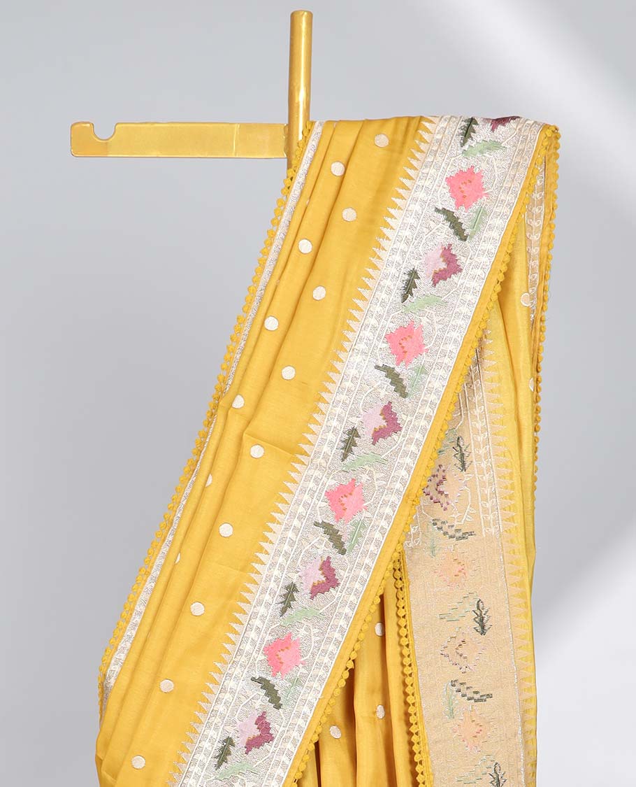 Yellow polka dot semi-banaras tussar saree & contrast floral thread embroidered border