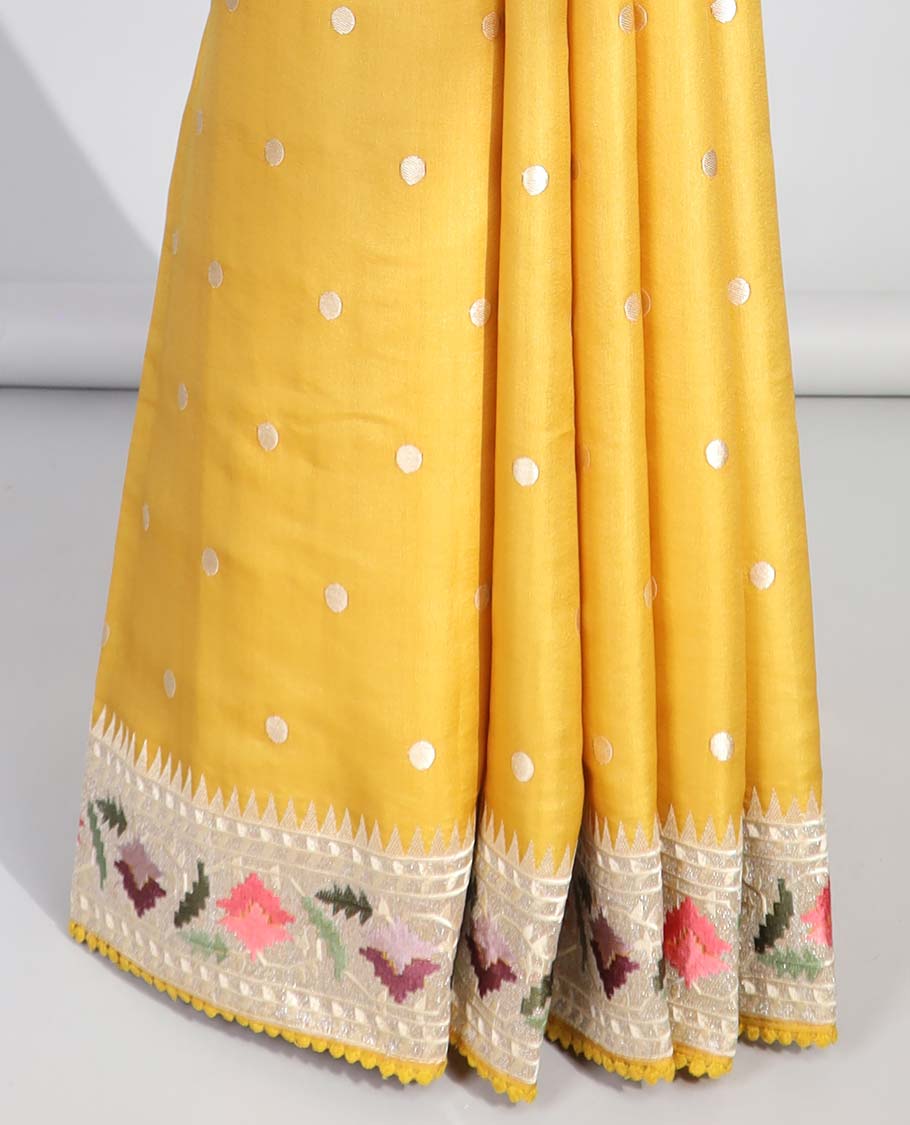 Yellow polka dot semi-banaras tussar saree & contrast floral thread embroidered border