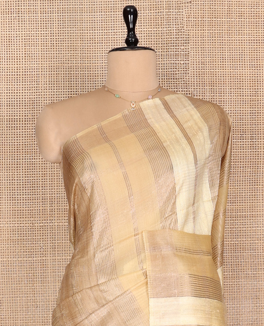 Sandal Tussar Silk Saree, Gleamed Up with Zari Stripes, a Subtle Border, Pallu of Stripes, and a Matching Blouse