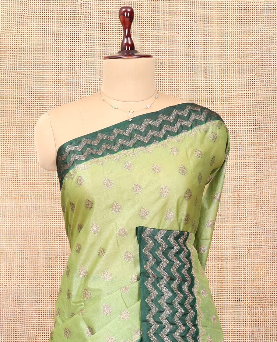 Green Tussar Silk Saree, Woven with Zari Buttas, a Contrast Chevron Zari Design Border, Floral Design Pallu, and a Contrast Blouse