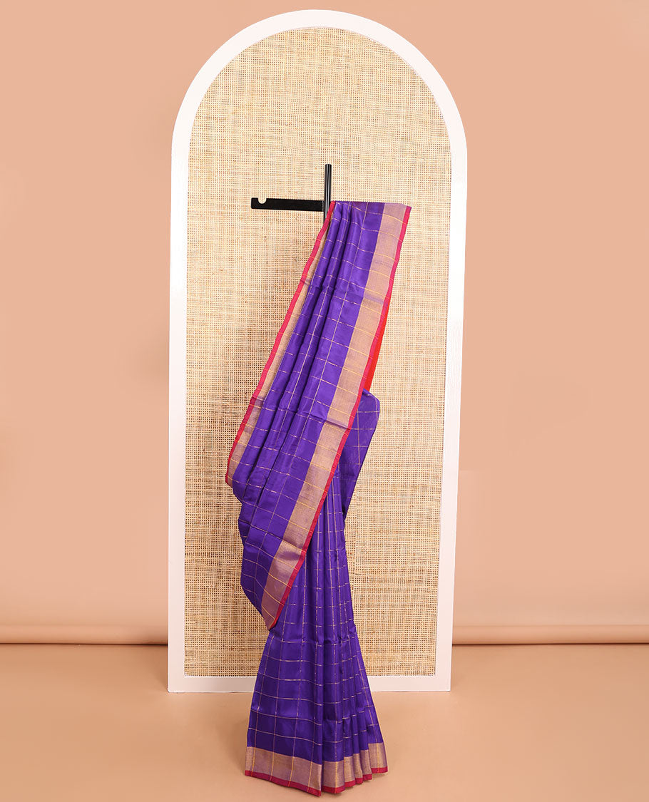 Blue checked uppada saree with contrast striped border & zari pallu