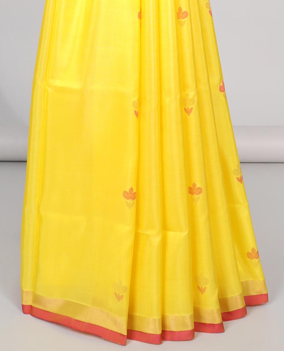 Yellow all-over flower motifs upadda silk saree with self zari border