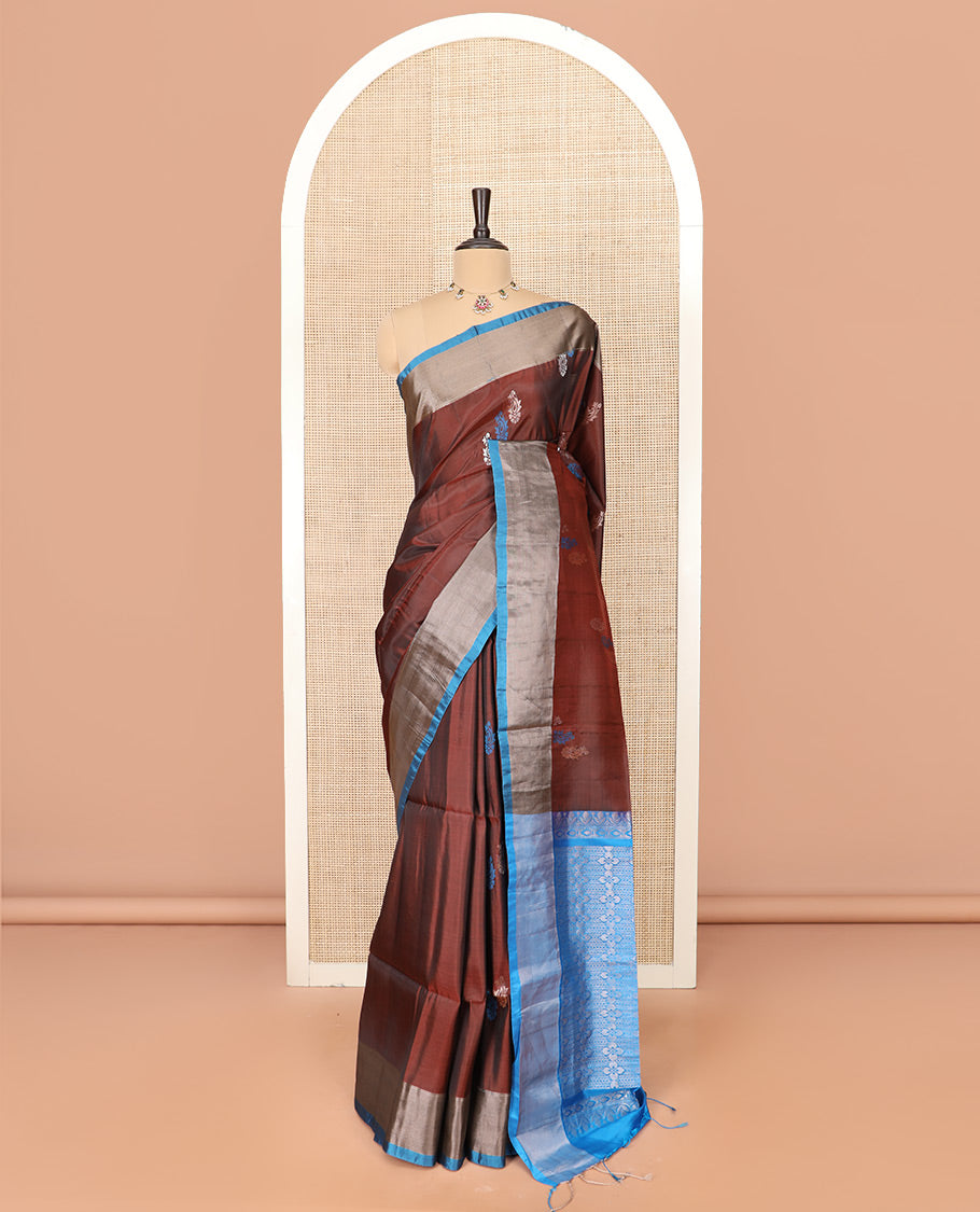 Brown Semi Uppada Saree Graced with Paisley Buttas, Complemented by a Contrasting Bavanji Border, Artfully Detailed Pallu of Intricate Zari Designs, and Paired with a Contrast Blouse