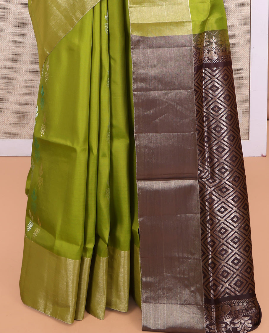 Green Uppada Saree, Elevated with Floral Zari Buttas, a Bavanji Border, Grand Jaal Pallu, and a Contrast Blouse