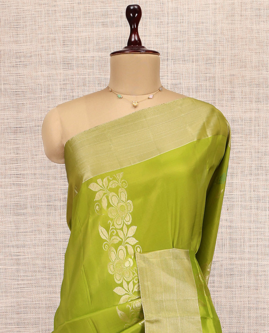 Green Uppada Saree, Elevated with Floral Zari Buttas, a Bavanji Border, Grand Jaal Pallu, and a Contrast Blouse