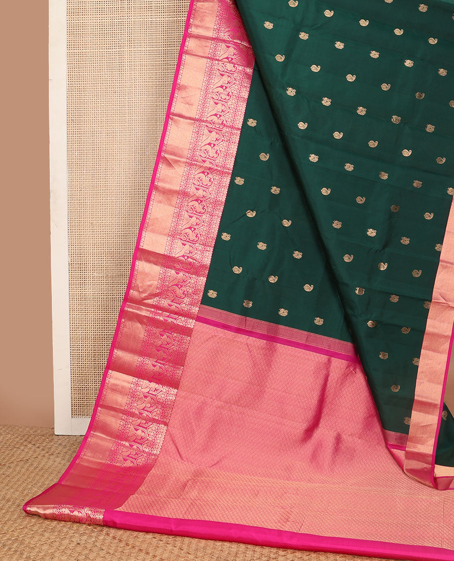 Bottle green buttas vasundhara silk saree with contrast zari design border & argyle design pallu
