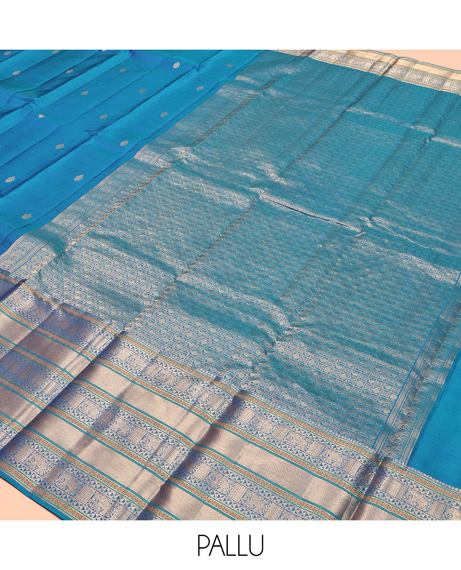 Blue Vasundhara Lite Silk Mix Saree Features Zari Buttas, a Zari Border of Kamalam, Ara Maadam, and Yaali, Pallu of Butta Enclosed Checks, and a Matching Blouse