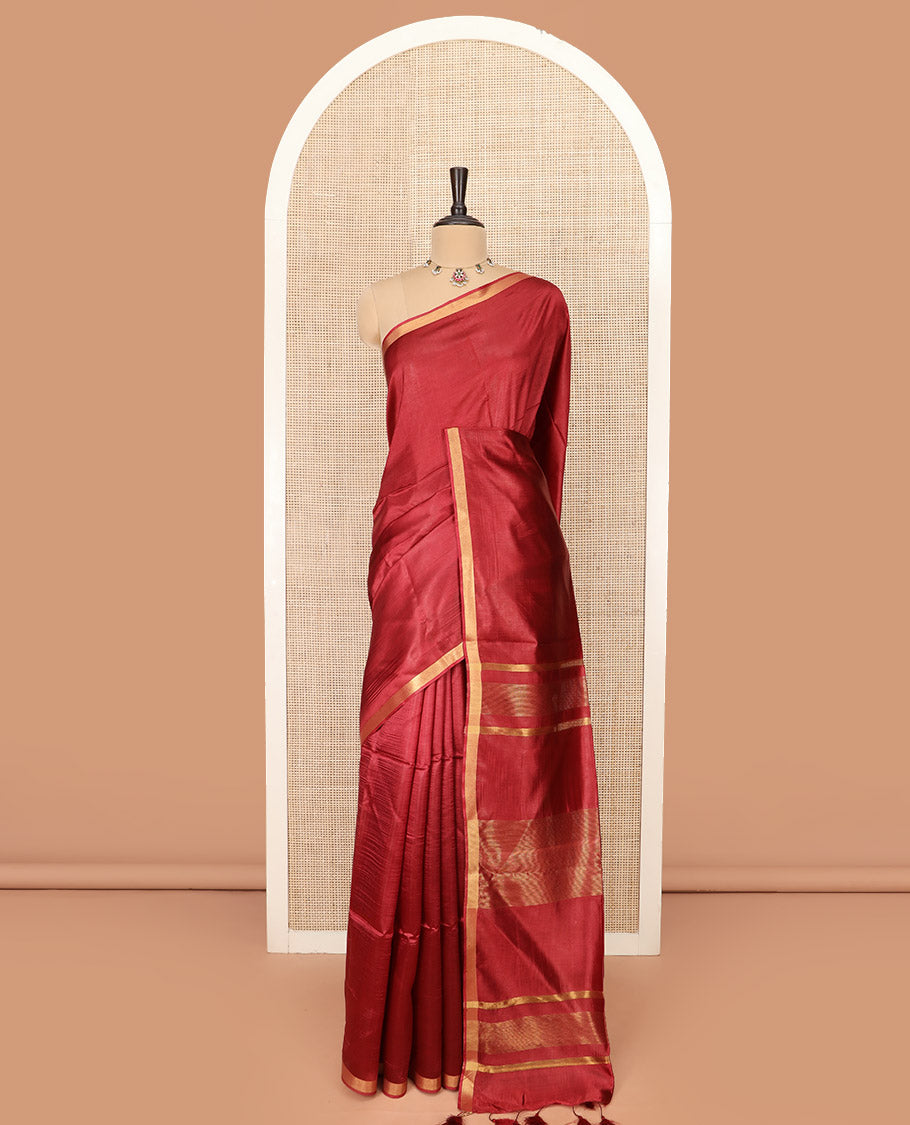 Maroon Plain Banana Pith Saree Subtly Sparkled with Zari Bavanji Border, Gleaming Zari Stripes Woven Pallu, and Paired with a Matching Plain Blouse
