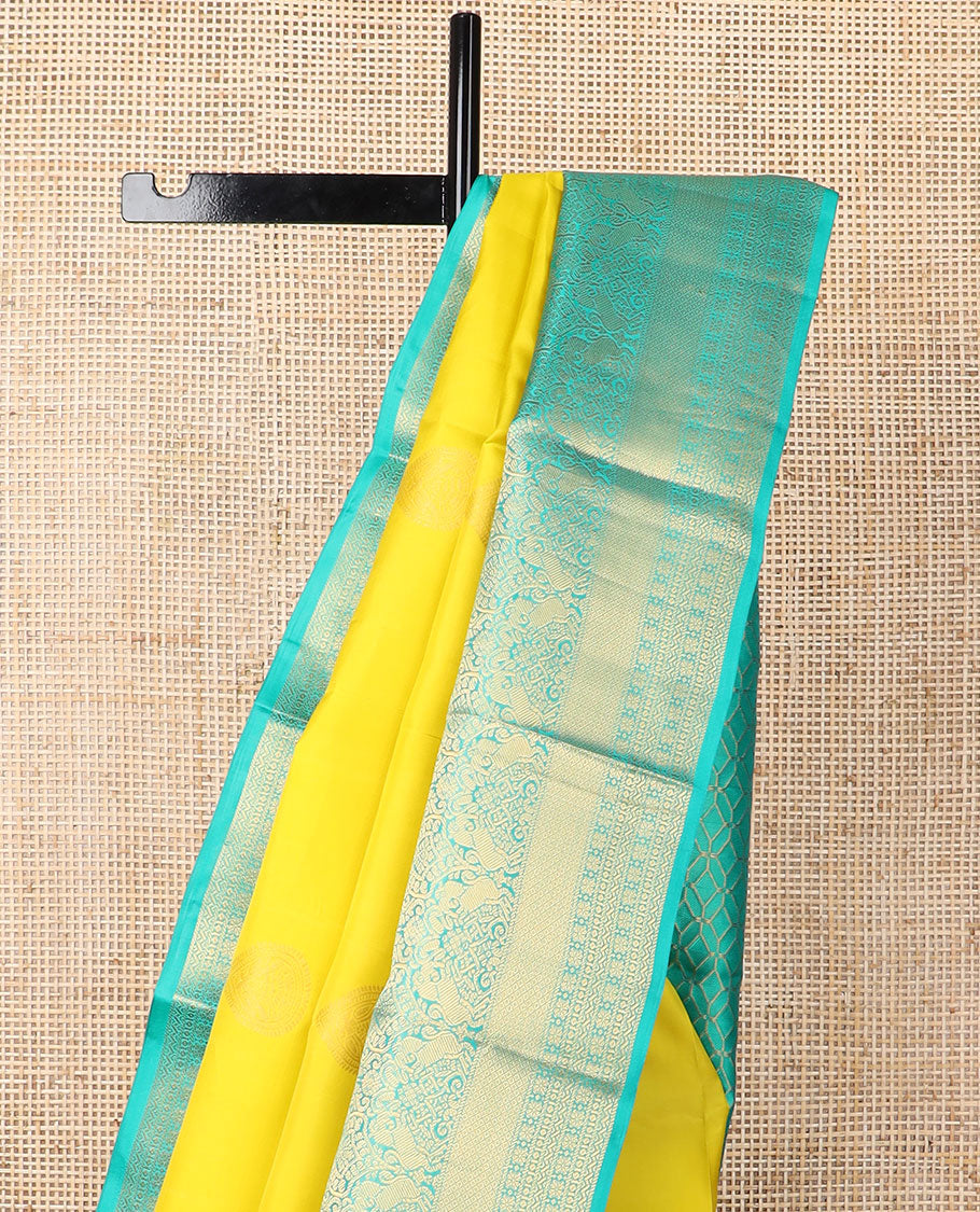 Yellow buttas silk saree with contrast zari design border & floral jaal design pallu