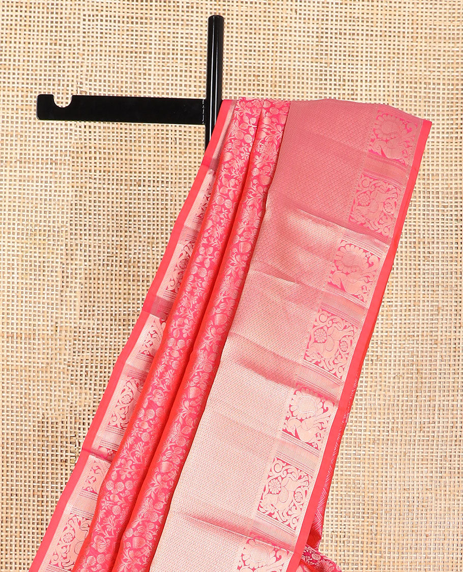 Red floral design kancheepuram silk saree with self border of intricate zari design border & floral design pallu