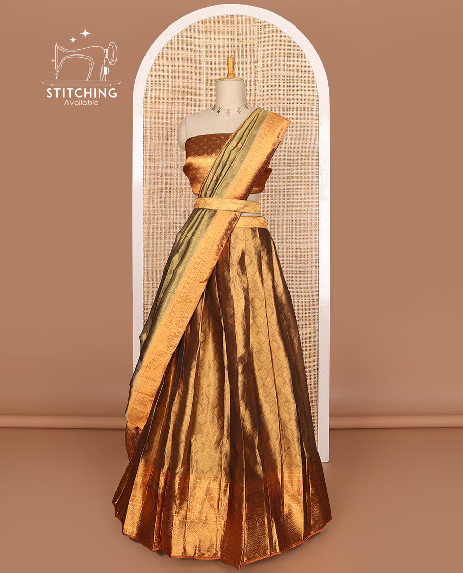 Brown ogee design tissue half saree with contrast zari design border, zari design blouse & floral design dhavani