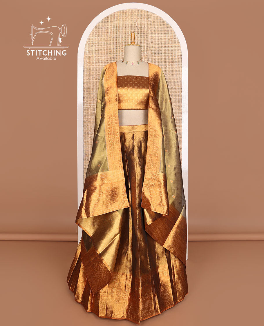 Brown ogee design tissue half saree with contrast zari design border, zari design blouse & floral design dhavani