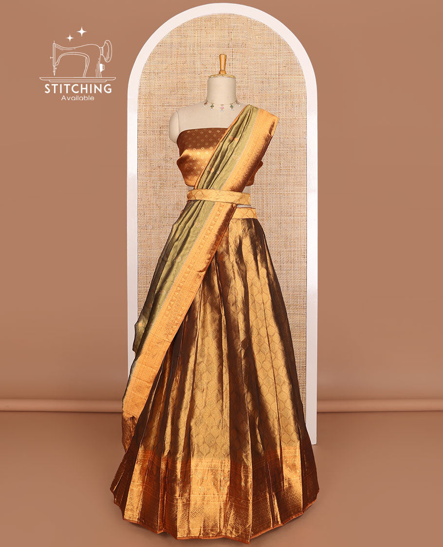 Brown ogee design tissue half saree with contrast zari design border, zari design blouse & floral design dhavani