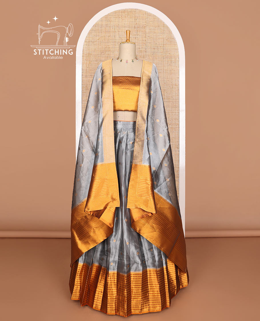Grey floral butta tissue half saree with contrast zari design border, floral zari design blouse & floral design dhavani