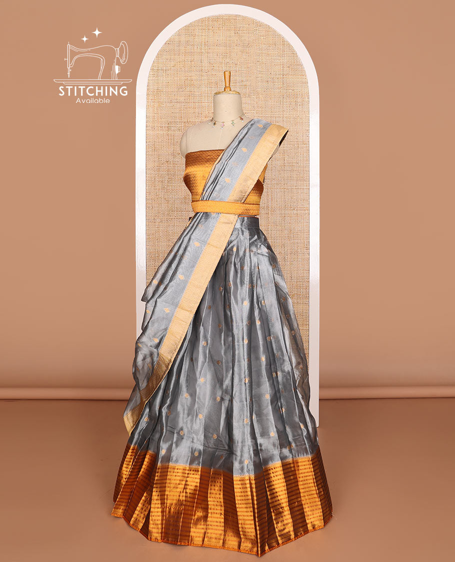 Grey floral butta tissue half saree with contrast zari design border, floral zari design blouse & floral design dhavani